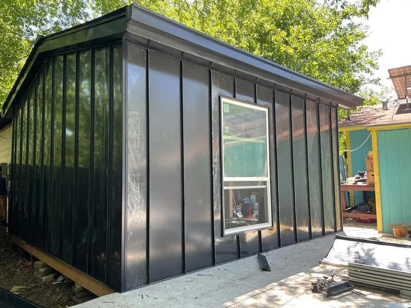 Black standing seam metal wall panels for Roof Inspection in Southgate